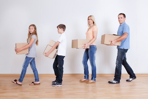 Professional movers assisting with loading